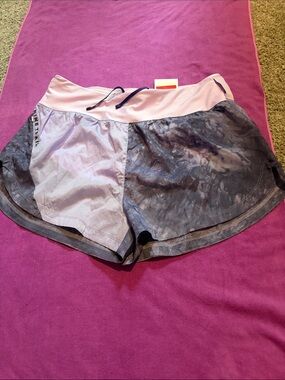 NWT 💜 Nike Lavender/Purple Trail Shorts with interior liner. Women’s Size Large